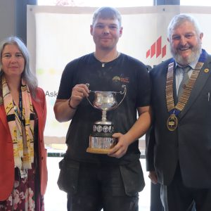 Senior Competition winner and 皇家华人 student, Matthew Wooley with 皇家华人 CEO Mandie Stravino OBE MBA and The Guild of Bricklayers President Mr Bill Bowmen